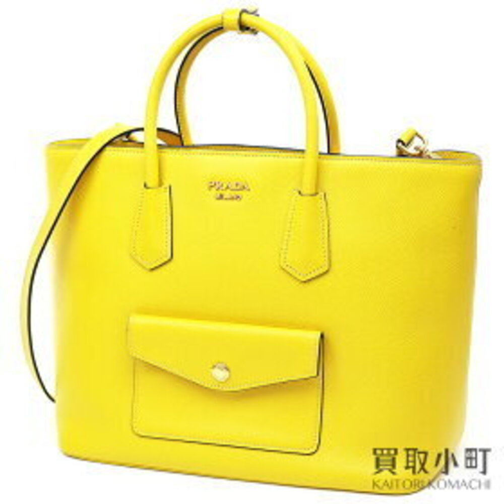 Prada Saffiano leather tote bag metal logo yellow shoulder shopping Cuir Giallo